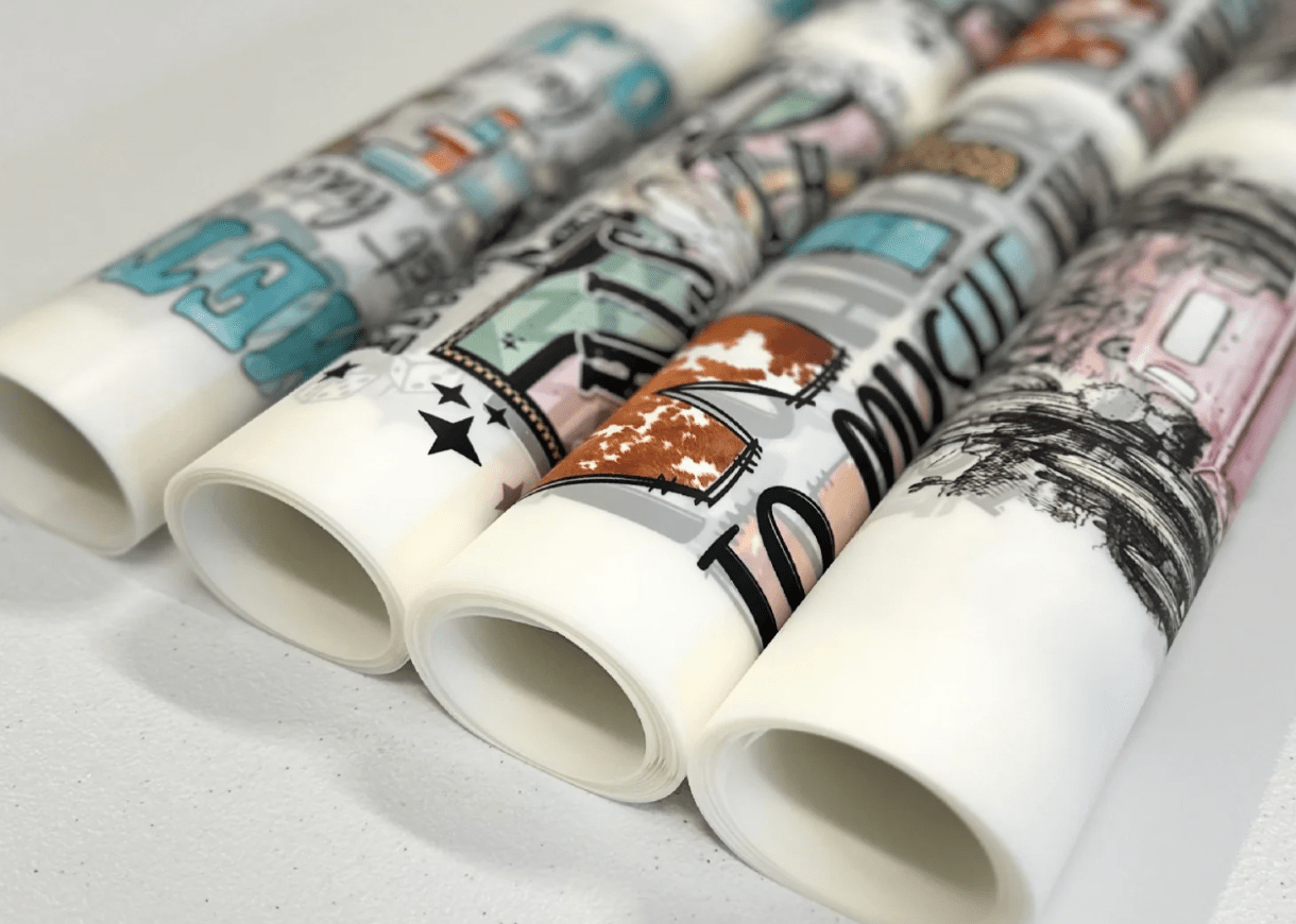 Rolled ready-to-press DTF gang sheet transfers produced by GPI Supplies